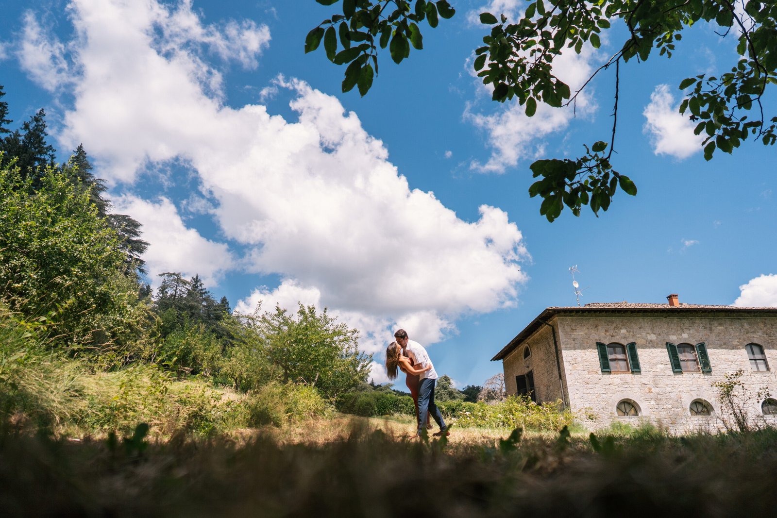 Candid engagement photography in Tuscany countryside