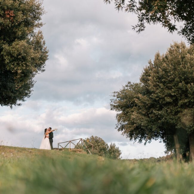 Intimate elopement in Tuscany countryside with olive trees and soft golden light